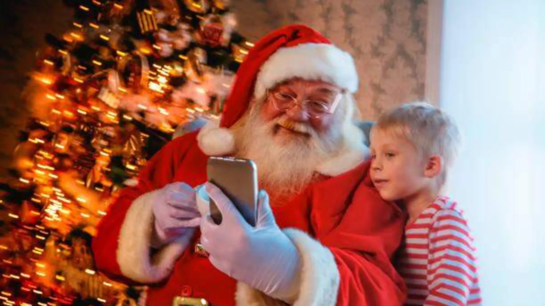 santa claus con un niño